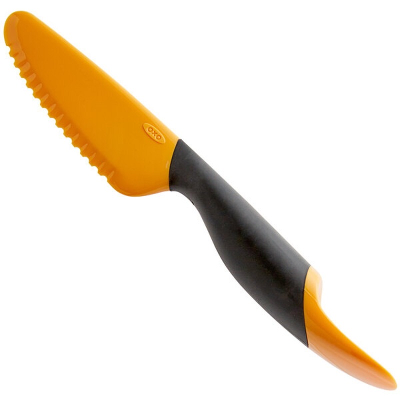 10" Orange Plastic Mango Slicer with Scoop
